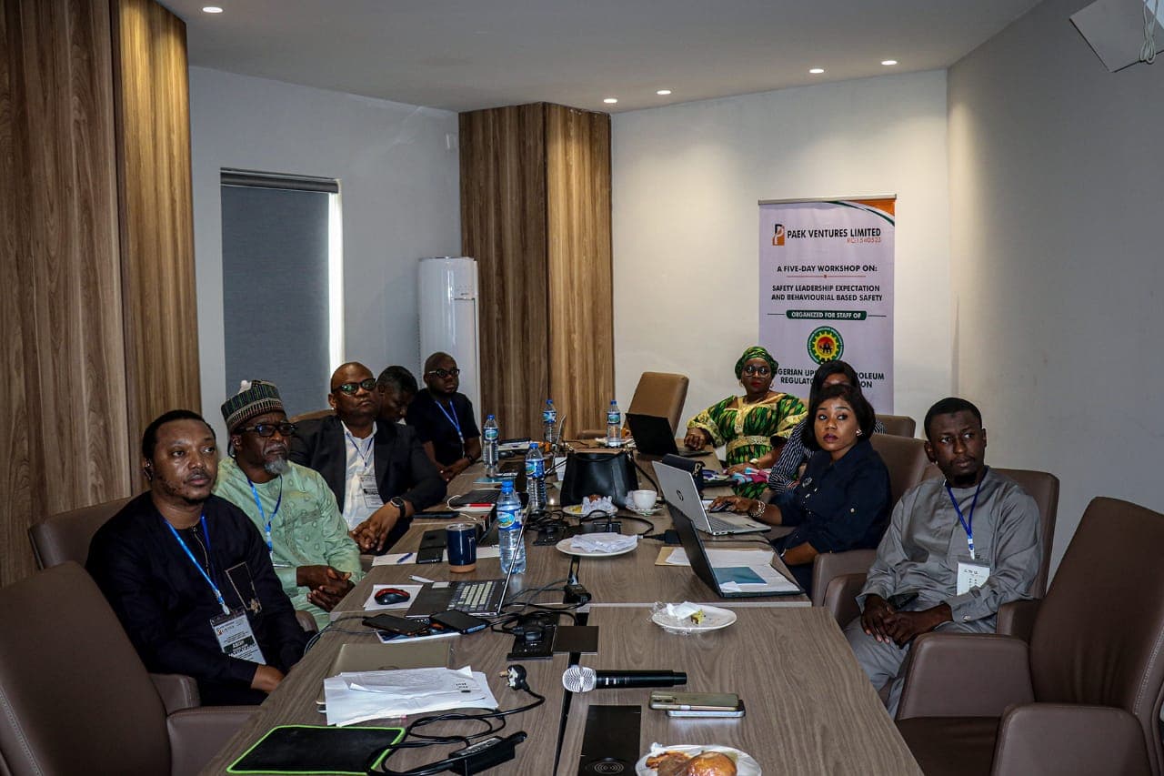NUPRC staff seated around a conference table during the Trauma-Informed, Behavioral-Based Safety training session in Abuja