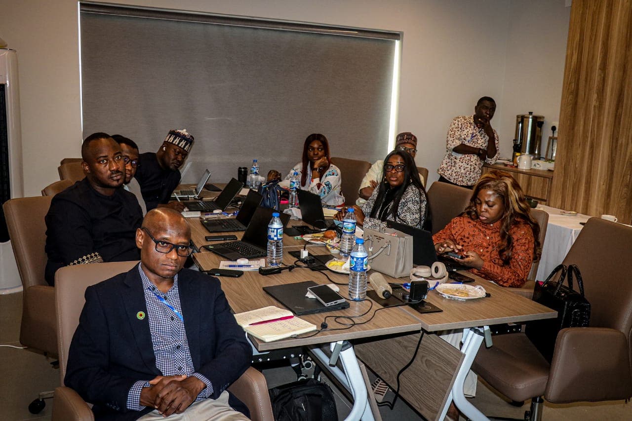 NUPRC staff working at laptops during a session of the safety training program